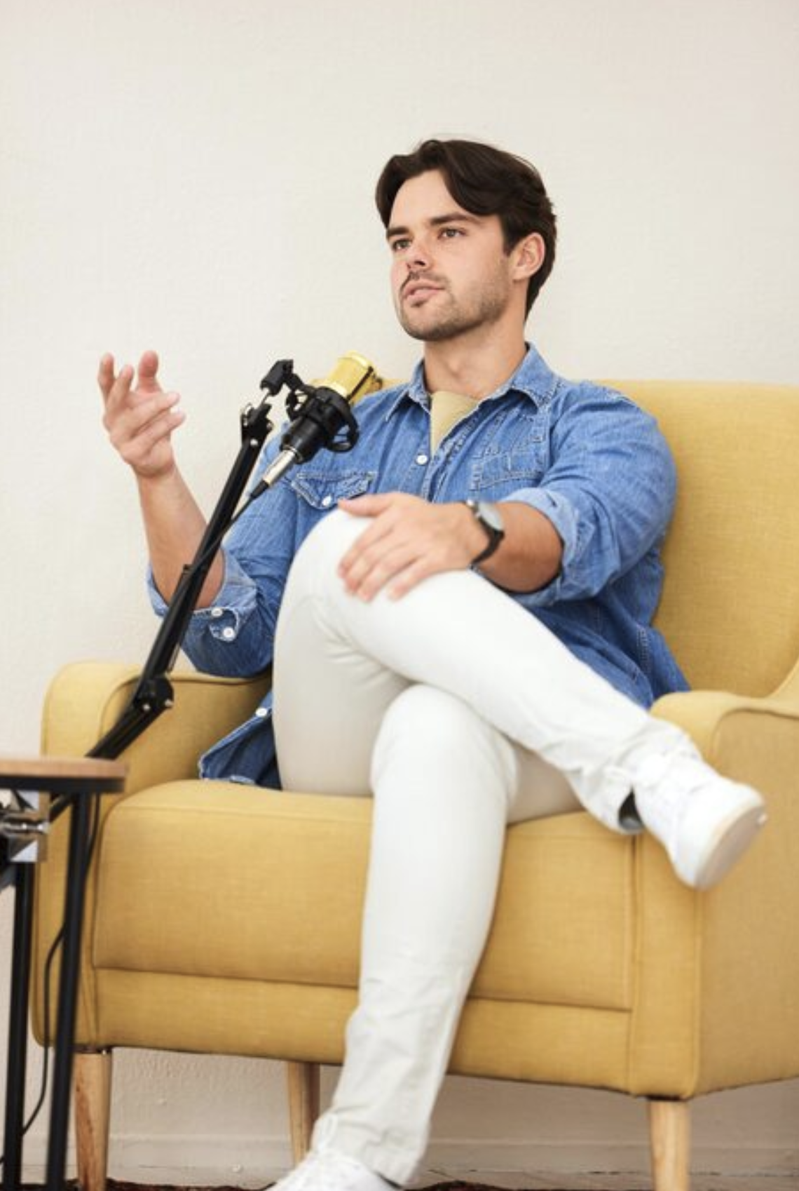 Leadership author recording their audiobook with a professional microphone
